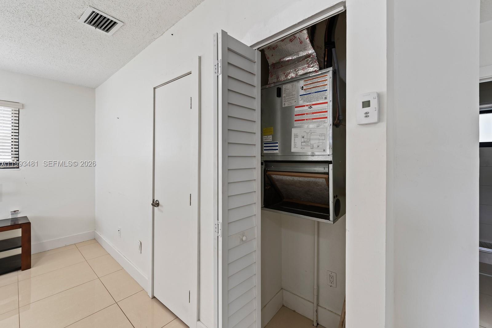 1911 Northwest 30th Street, Unit 4 Miami, FL 33142 - Photo 13 of 15 a view of walk in closet