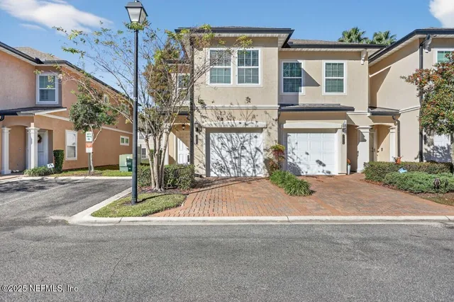 front view of a house with a street