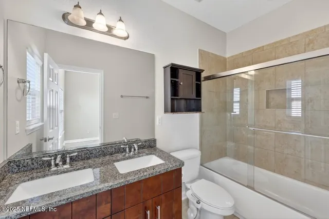 a view of swimming pool with outdoor seating