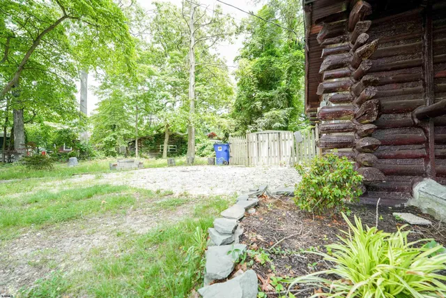 a view of livingroom with furniture and window