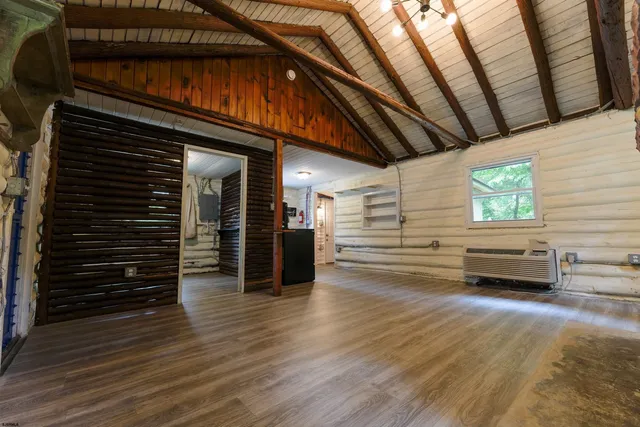 a bathroom with a toilet sink and shower