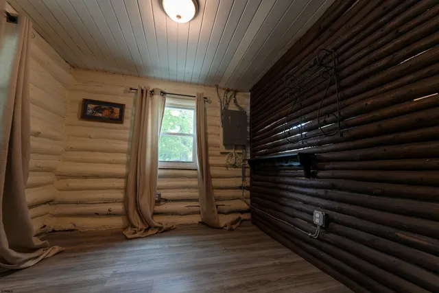 a kitchen with stainless steel appliances kitchen island granite countertop a refrigerator and a stove top oven