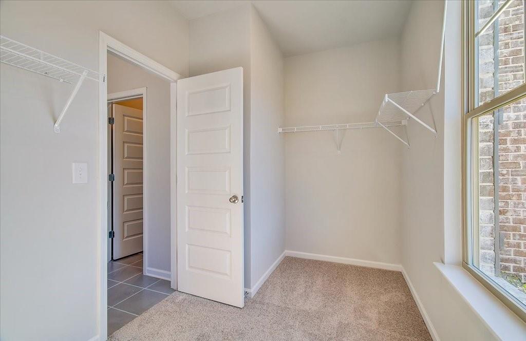 601 Button Grove Stockbridge, GA 30281 - Photo 13 of 37 an empty room with windows and closet