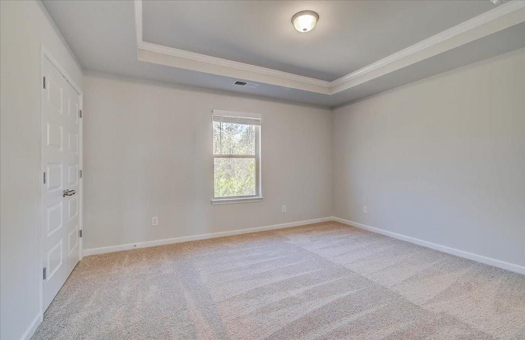 601 Button Grove Stockbridge, GA 30281 - Photo 27 of 37 an empty room with a window