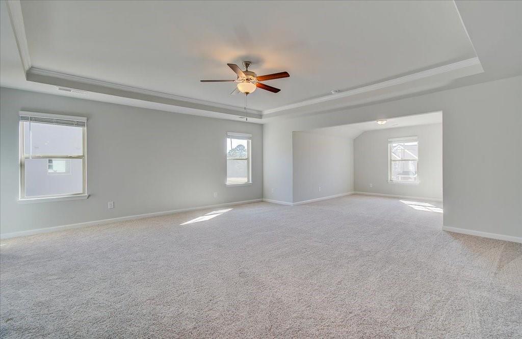601 Button Grove Stockbridge, GA 30281 - Photo 29 of 37 a view of a livingroom with a ceiling fan and window