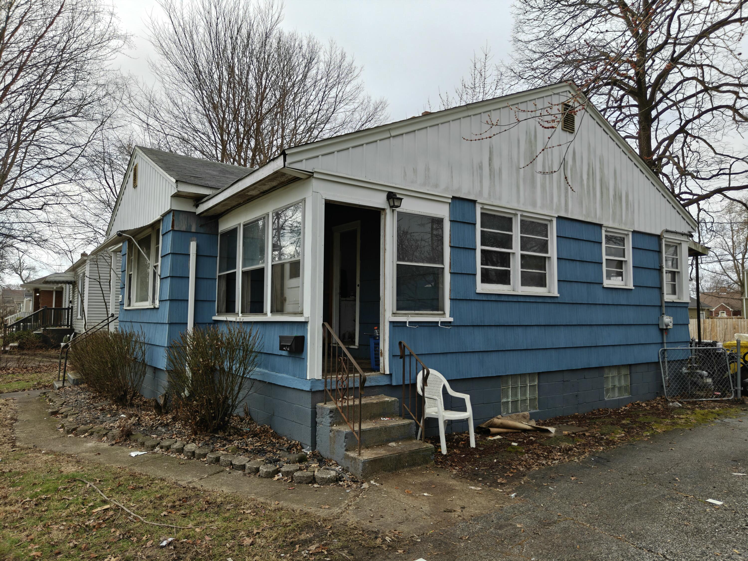 238 North Indiana Street Griffith, IN 46319 - Photo 2 of 23 a front view of a house with a yard