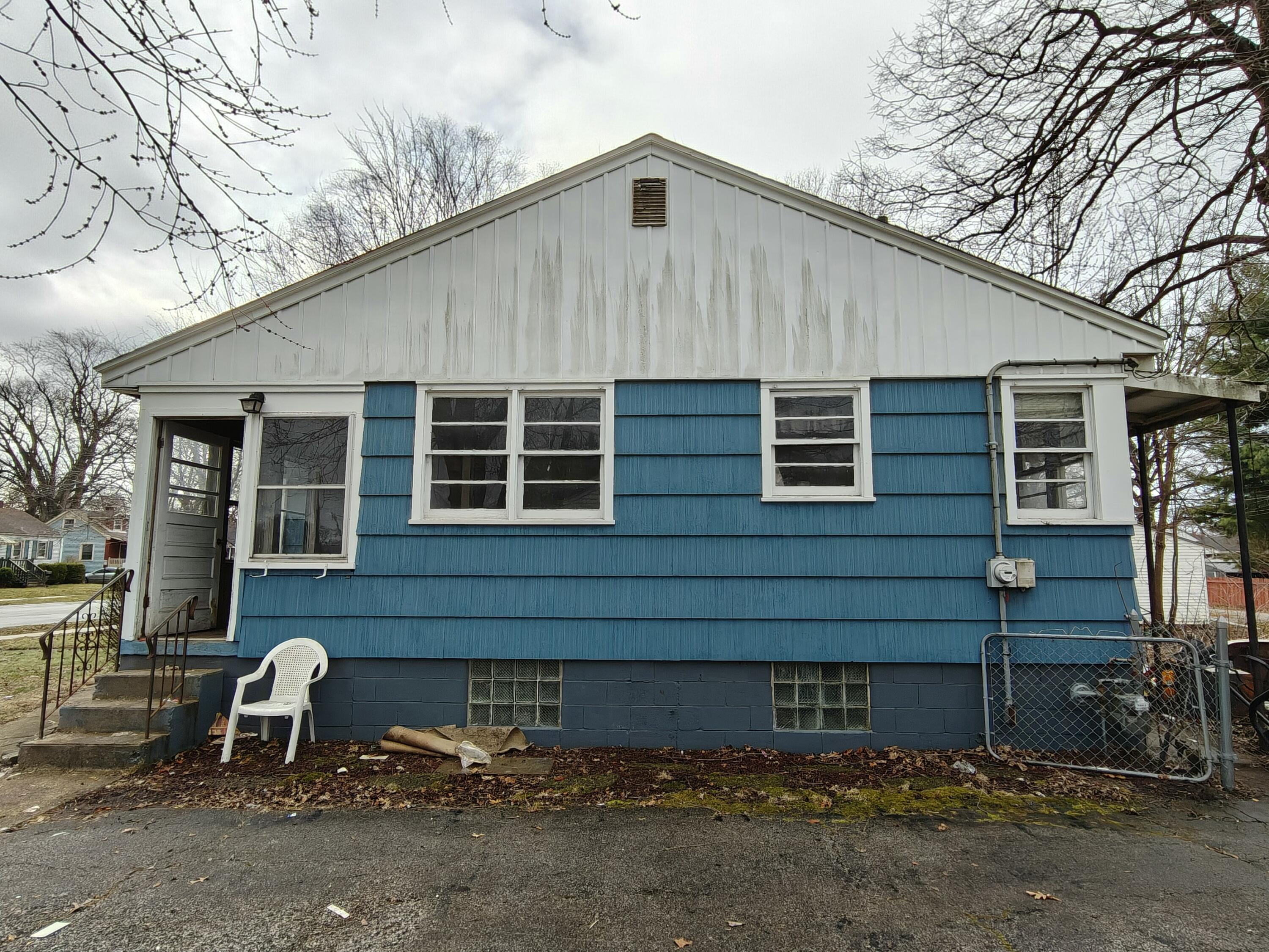 238 North Indiana Street Griffith, IN 46319 - Photo 3 of 23 a front view of a house with parking area