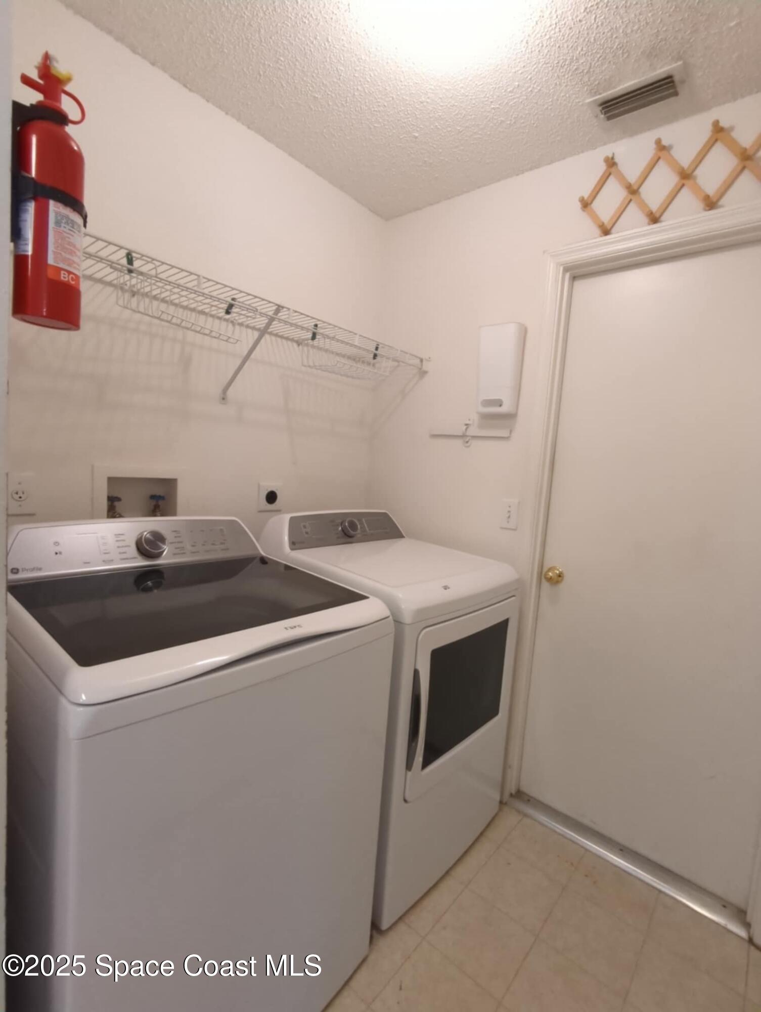 1328 Whitehurst Road Southwest Palm Bay, FL 32908 - Photo 21 of 22 laundry room