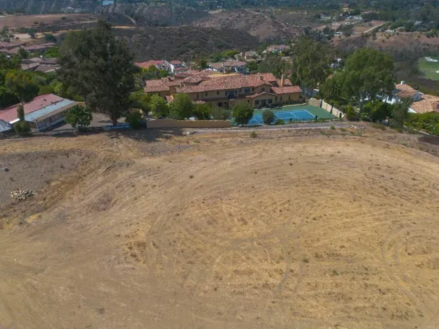a view of a road with an ocean