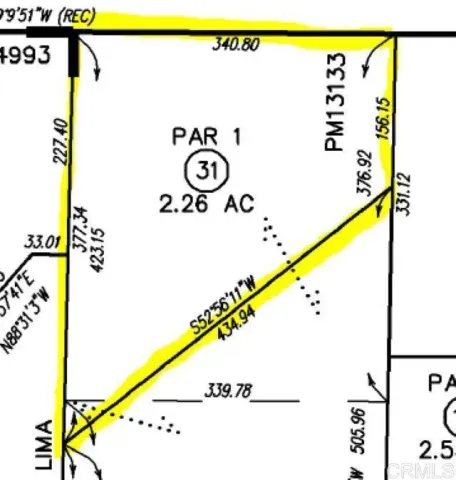 a view of swimming pool with a yard and sitting area