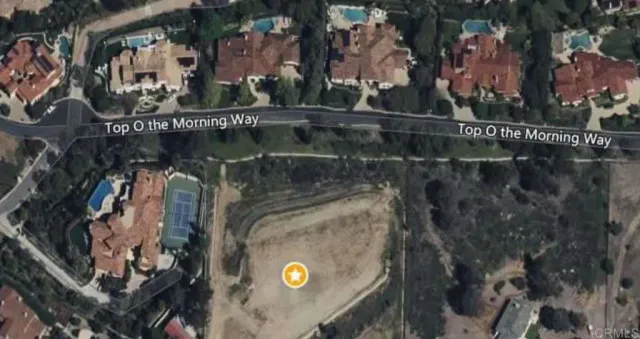 a view of a city with mountains in the background