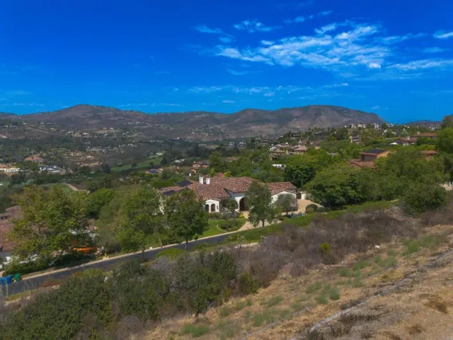 a view of a golf course with a lake
