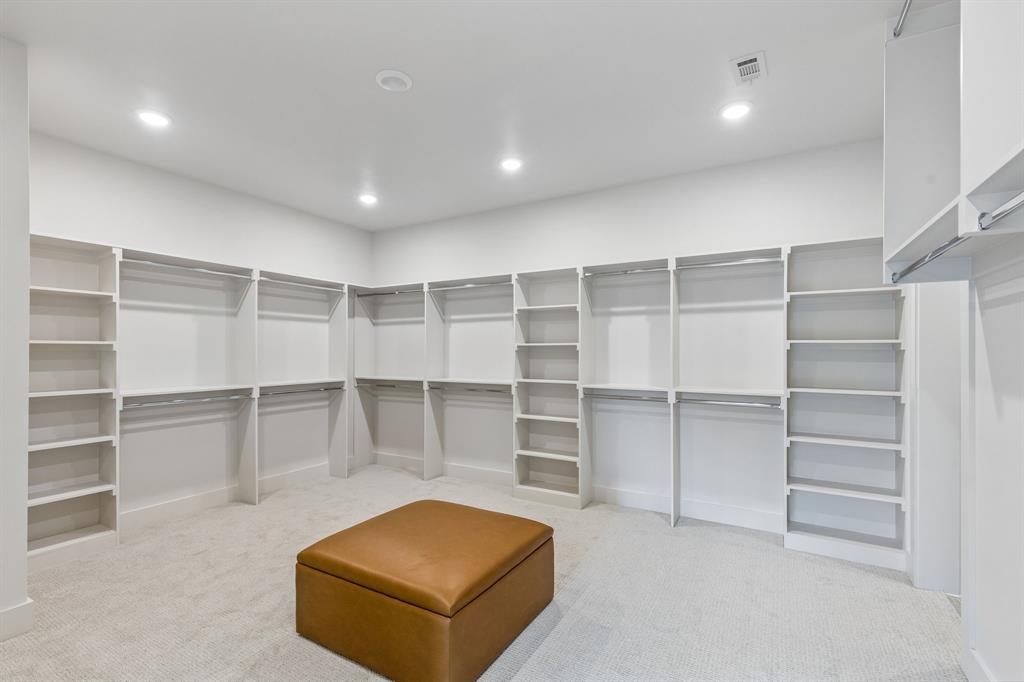 508 Copper Ridge Drive Richardson, TX 75080 - Photo 21 of 40 Primary closet. Island with storage coming soon!