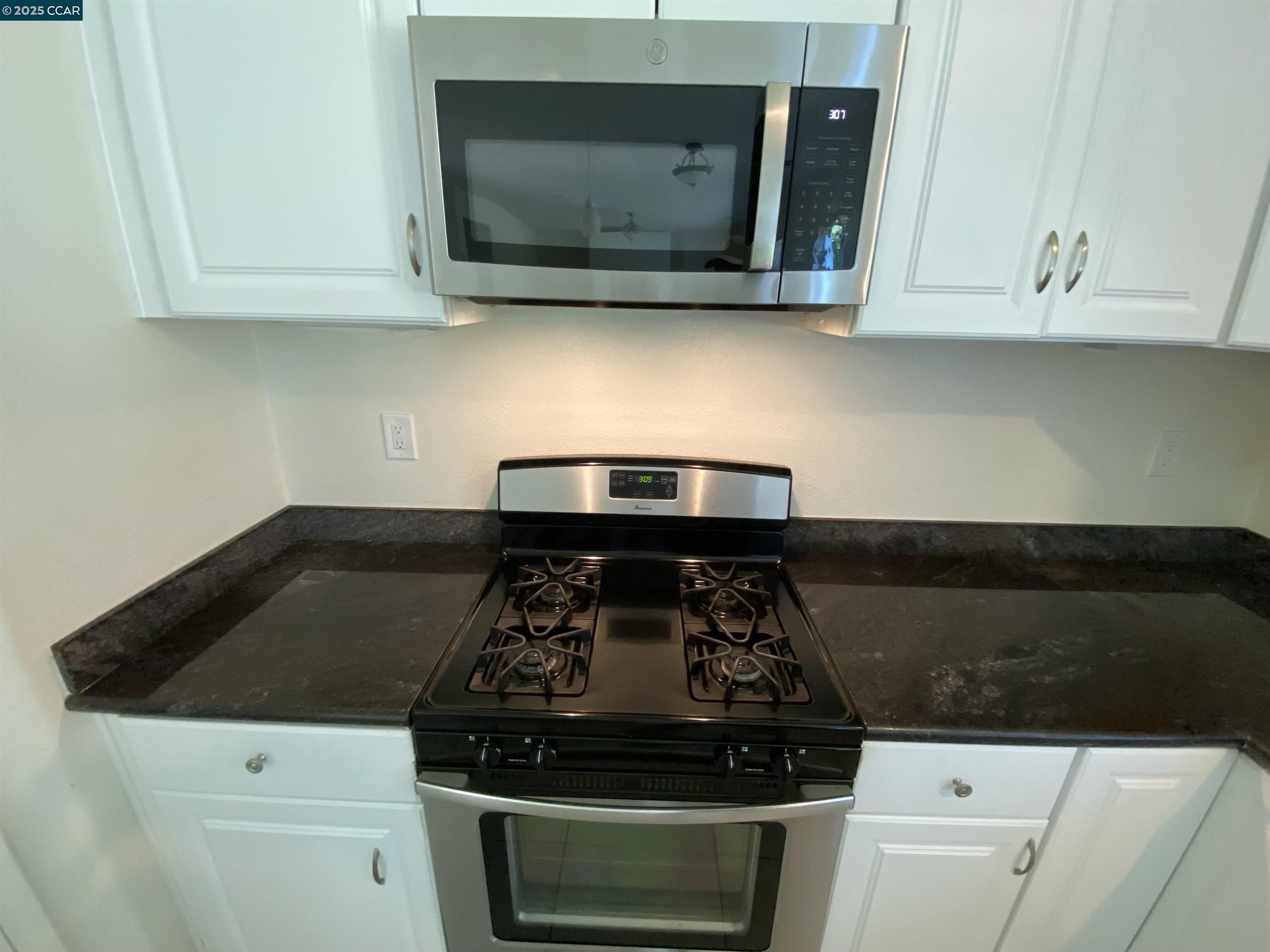 1900 La Veranda Place Martinez, CA 94553 - Photo 11 of 57 a stove top oven sitting inside of a kitchen