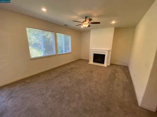 a living room with a fireplace