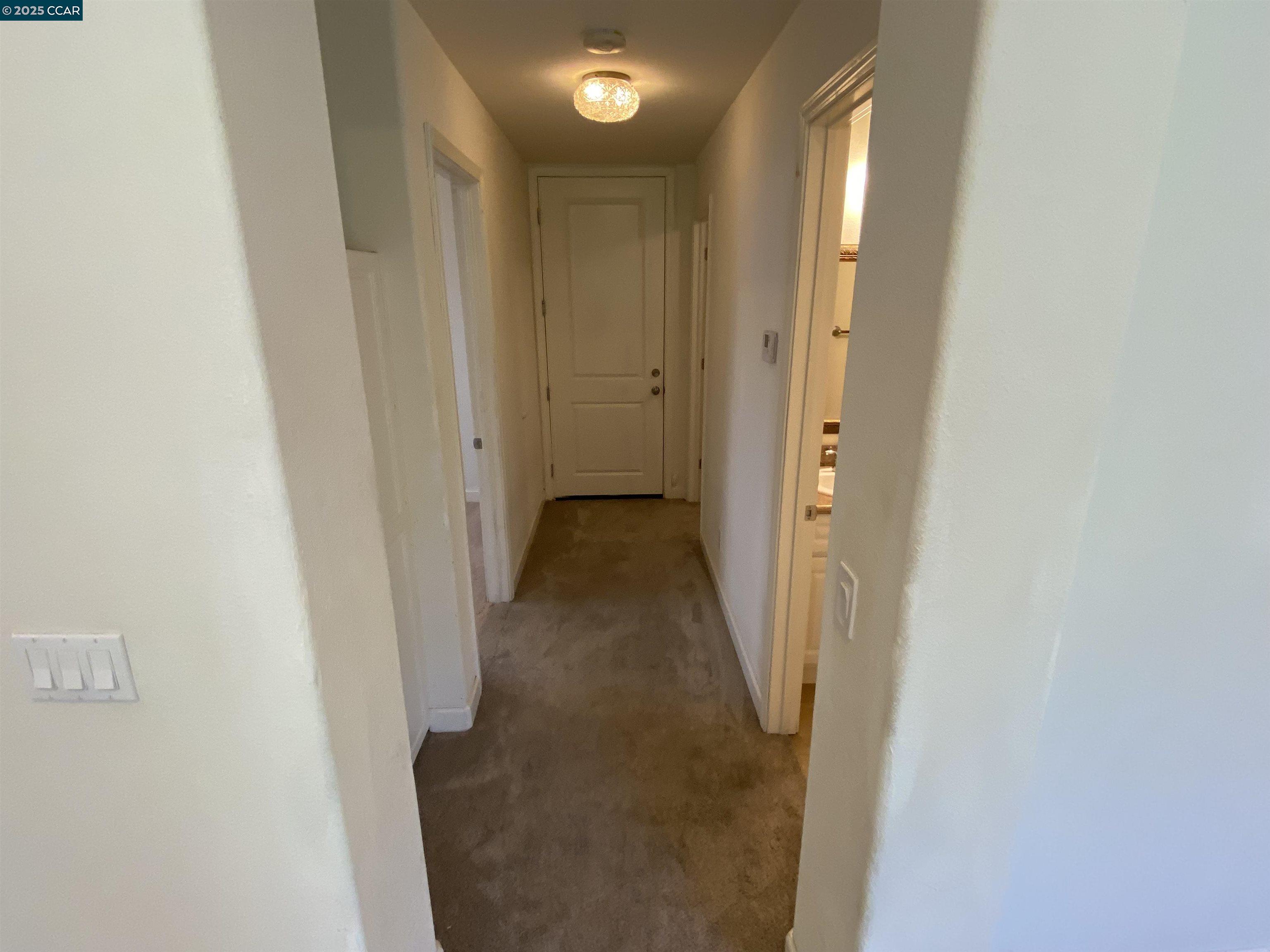 1900 La Veranda Place Martinez, CA 94553 - Photo 17 of 57 a view of a hallway with wooden floor