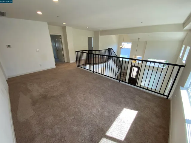 a view of a hallway with a furniture