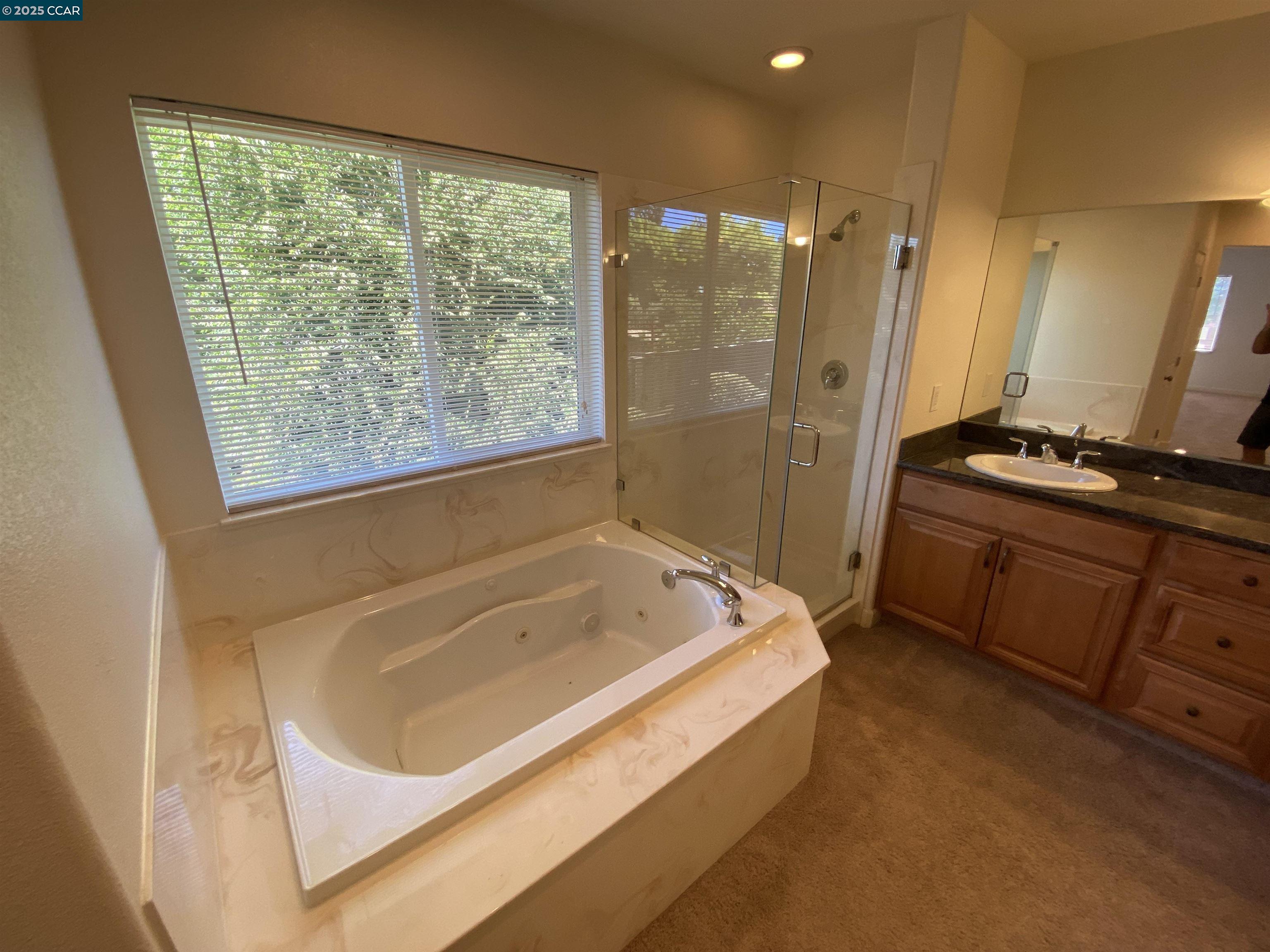 1900 La Veranda Place Martinez, CA 94553 - Photo 41 of 57 a bathroom with a tub sink and mirror