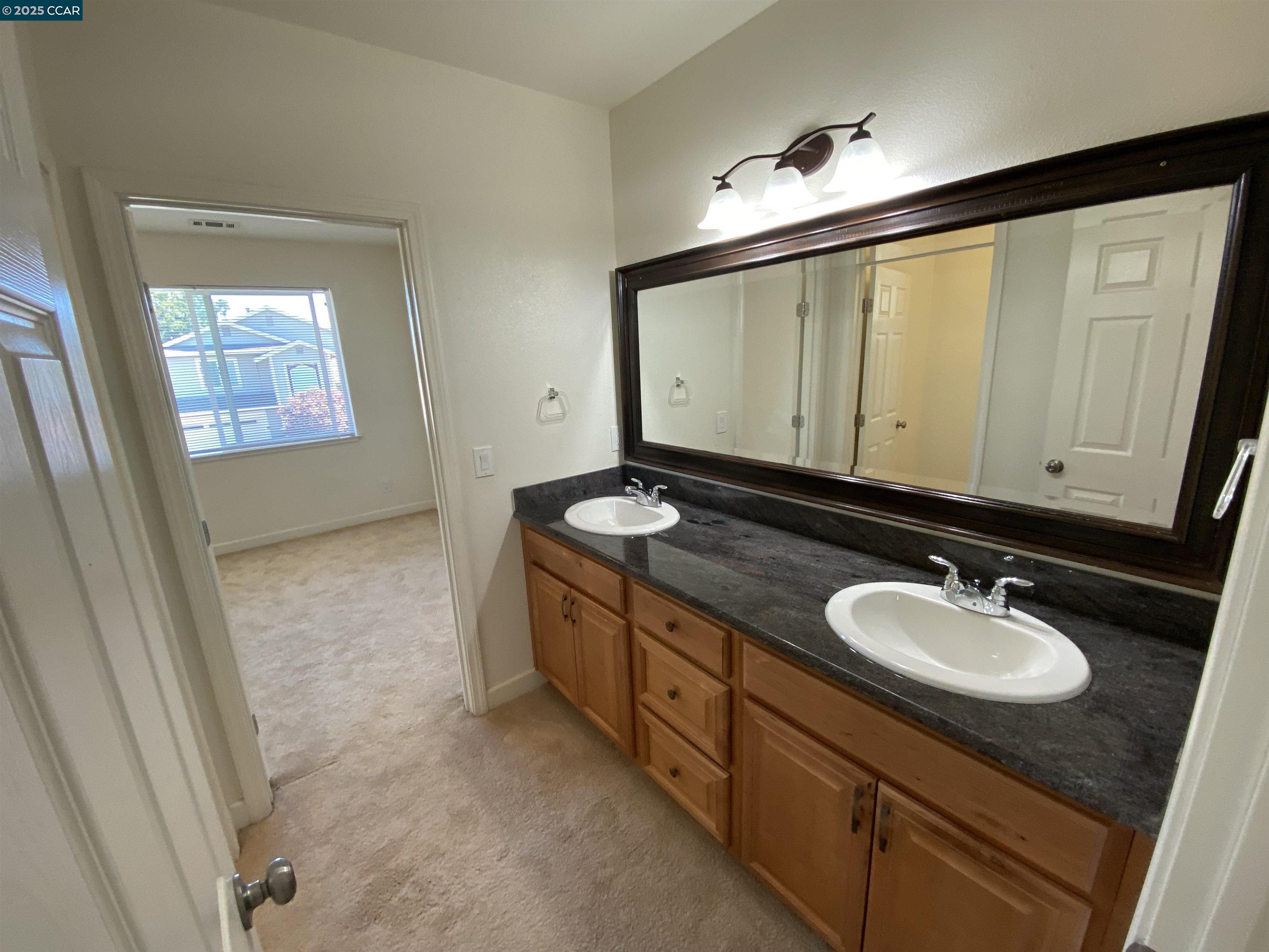 1900 La Veranda Place Martinez, CA 94553 - Photo 46 of 57 a bathroom with a sink and a mirror