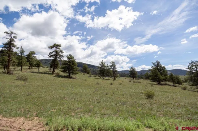 a view of mountain with lake view
