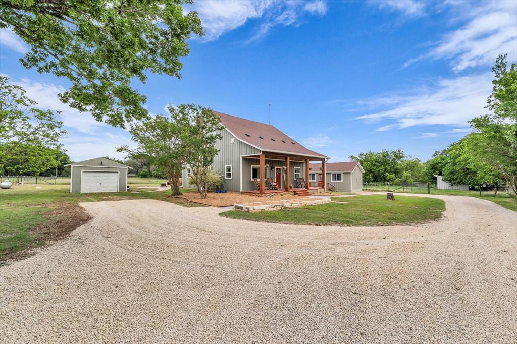 348 Barker Lane Waco, TX 76705 - Photo 2 of 39 a front view of a house with a yard