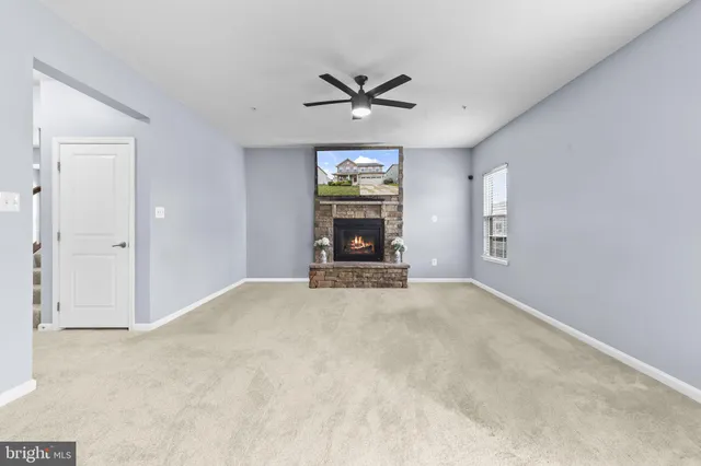 a view of a livingroom with a flat screen tv