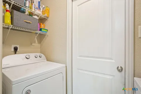 a view of balcony with furniture