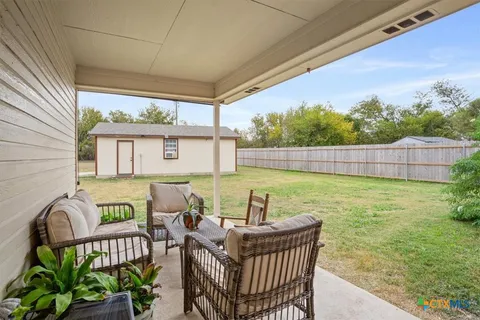 a house view with a outdoor space