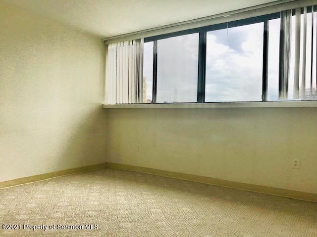220 Linden Street, Unit 710 Scranton, PA 18503 - Photo 5 of 13 an empty room with a window