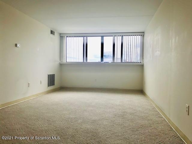 220 Linden Street, Unit 710 Scranton, PA 18503 - Photo 6 of 13 an empty room with a window