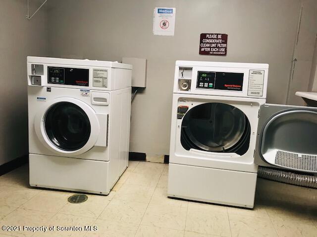 220 Linden Street, Unit 710 Scranton, PA 18503 - Photo 9 of 13 a utility room with dryer and washer