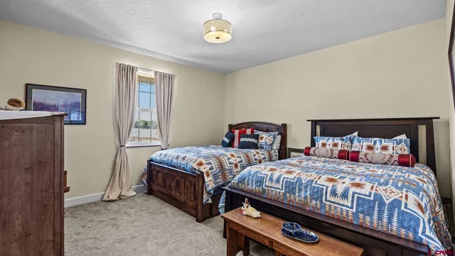 a room with gym equipment and a window