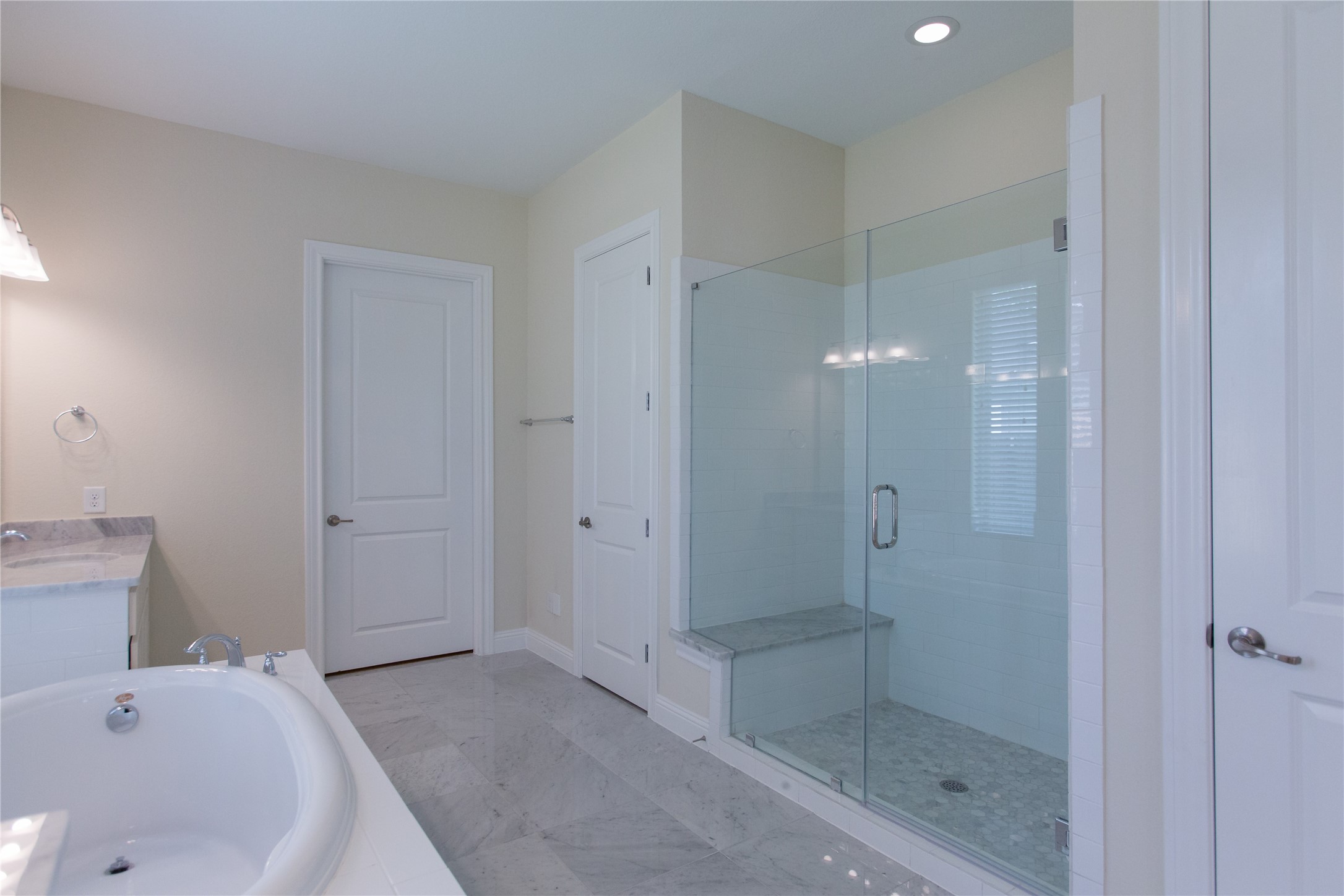 7402 Kearney Hill Lane Spring, TX 77389 - Photo 14 of 23 a bathroom with a bathtub and shower