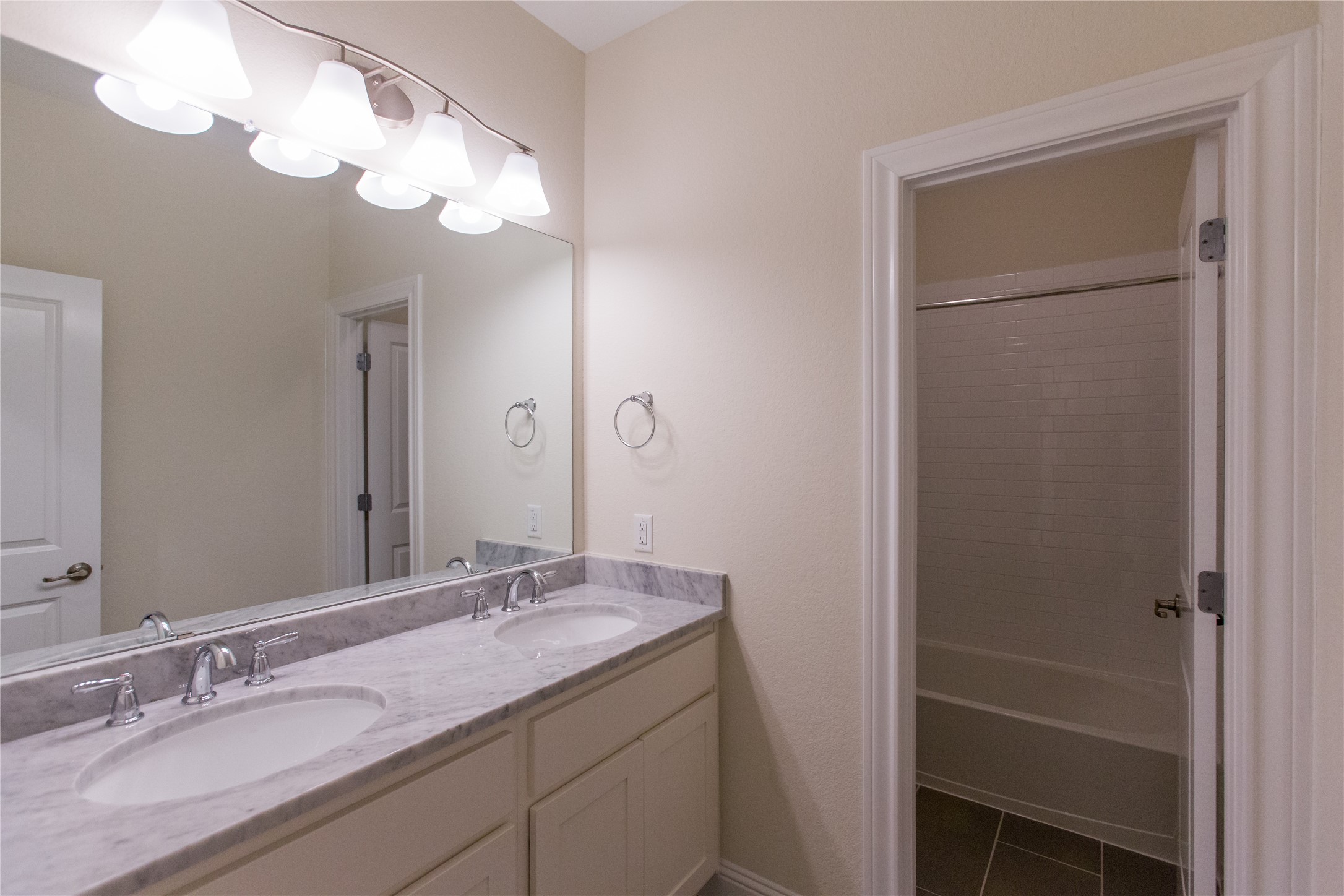7402 Kearney Hill Lane Spring, TX 77389 - Photo 17 of 23 a bathroom with a granite countertop sink and a mirror