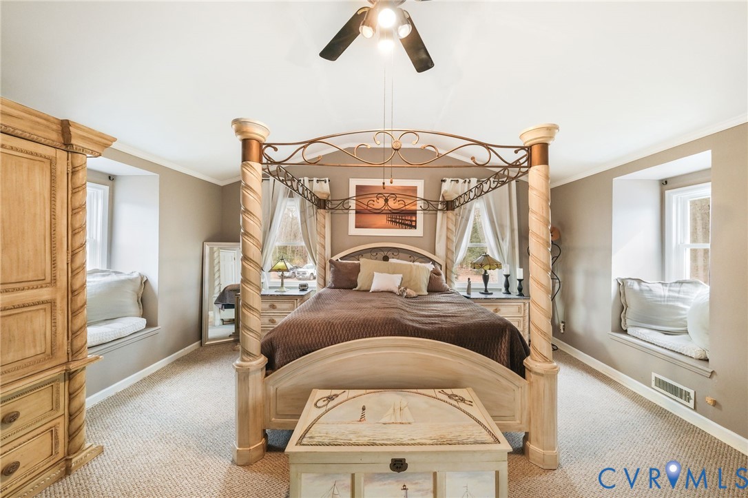 844 Monarch Shores Road Kilmarnock, VA 22482 - Photo 21 of 54 a view of a balcony with a couch