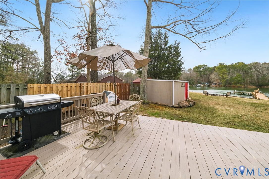 844 Monarch Shores Road Kilmarnock, VA 22482 - Photo 25 of 54 a view of a patio with wooden floor