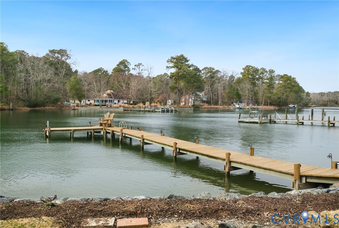 844 Monarch Shores Road Kilmarnock, VA 22482 - Photo 41 of 54 a view of residential house with outdoor space and lake view