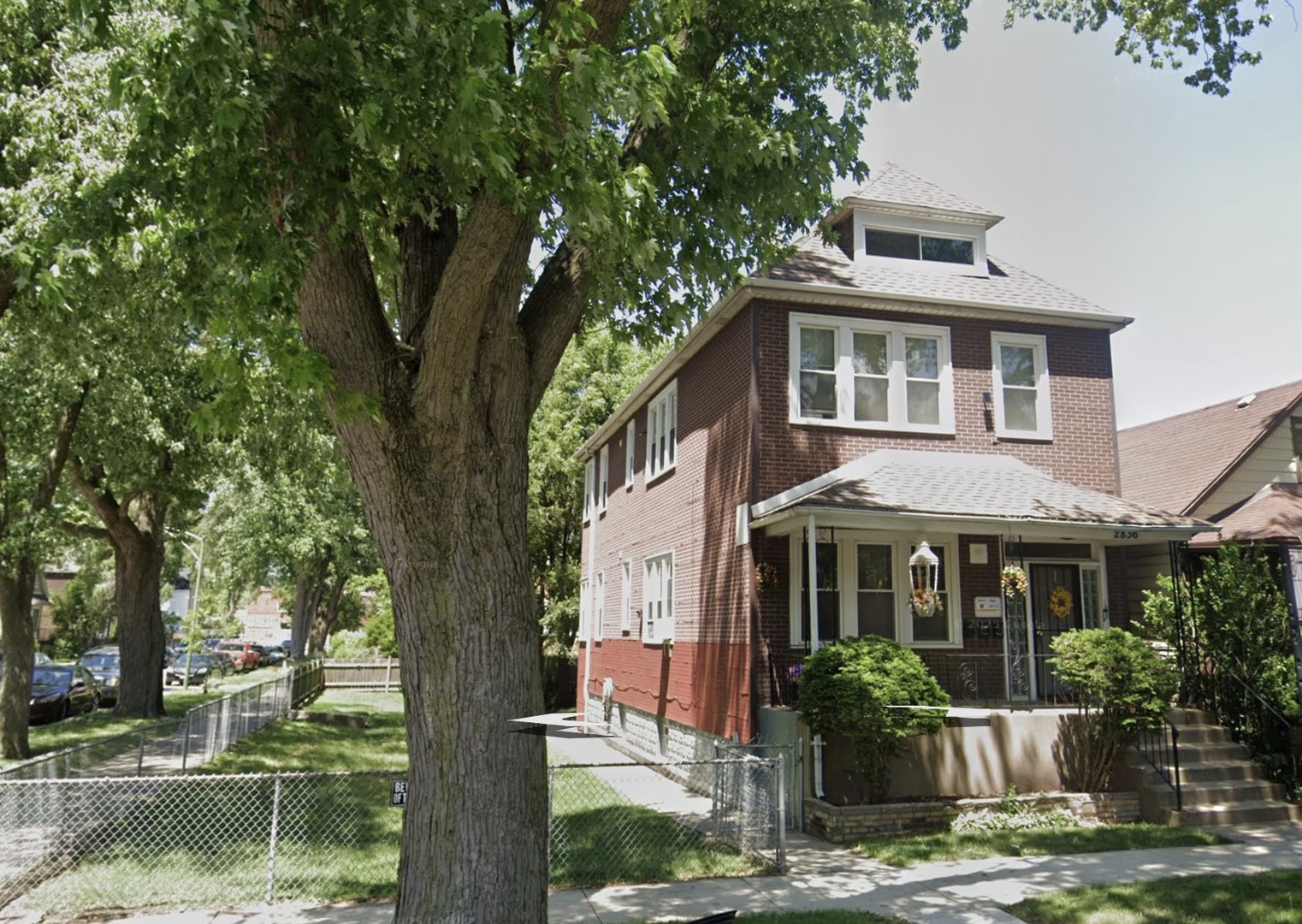 2836 East 84th Street Chicago, IL 60617 - Photo 7 of 7 a front view of a house with garden