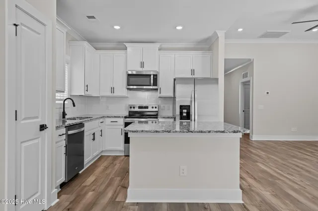 $373,900 | 103 Umbrella Palm Drive, Hampstead, NC 28443