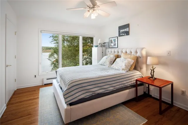 a bed room with a bed and a window