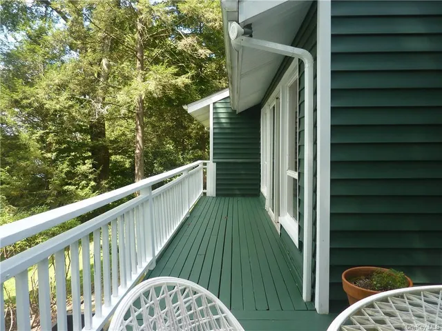 a view of a lake with a building in the background