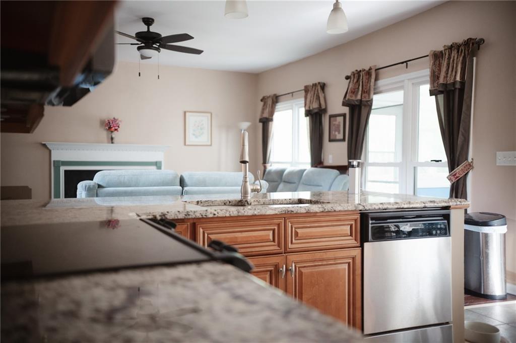 2932 Sunset View Circle Suwanee, GA 30024 - Photo 13 of 44 a kitchen with sink refrigerator and window
