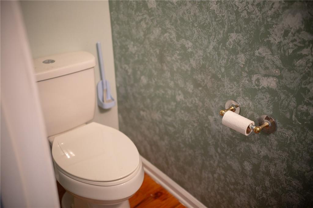 2932 Sunset View Circle Suwanee, GA 30024 - Photo 19 of 44 a white toilet sitting next to a shower