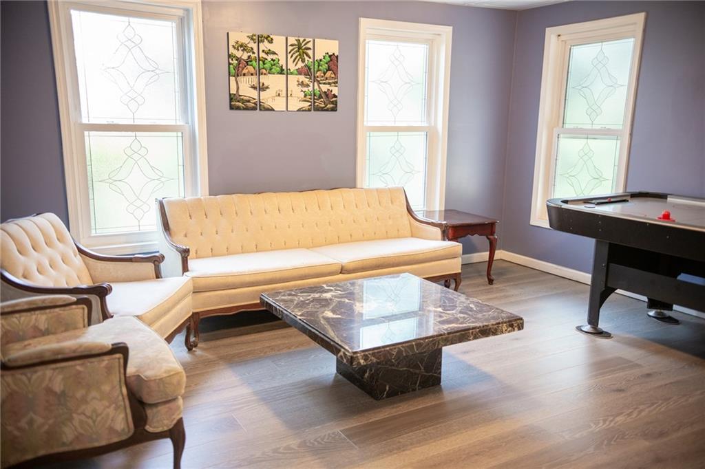 2932 Sunset View Circle Suwanee, GA 30024 - Photo 28 of 44 a living room with furniture and a window