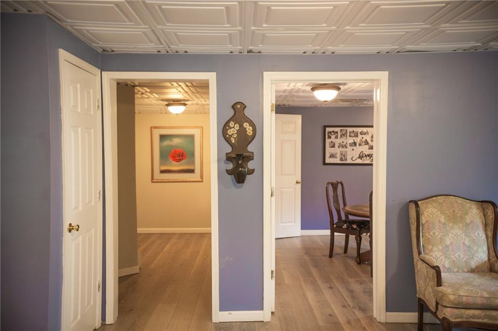 2932 Sunset View Circle Suwanee, GA 30024 - Photo 32 of 44 a view of livingroom with furniture and wooden floor