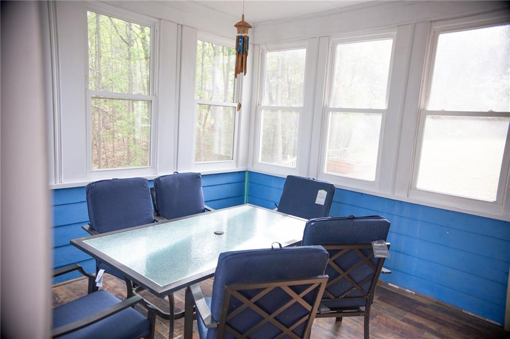 2932 Sunset View Circle Suwanee, GA 30024 - Photo 43 of 44 a view of a dining room with furniture and a window