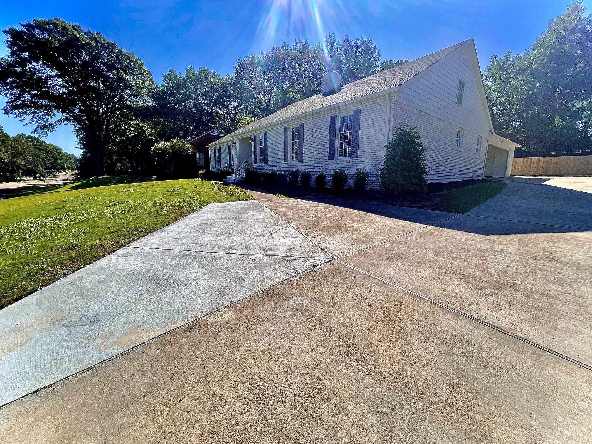 5523 Walnut Grove Road Memphis, TN 38120 - Photo 21 of 21 a house view with a garden space