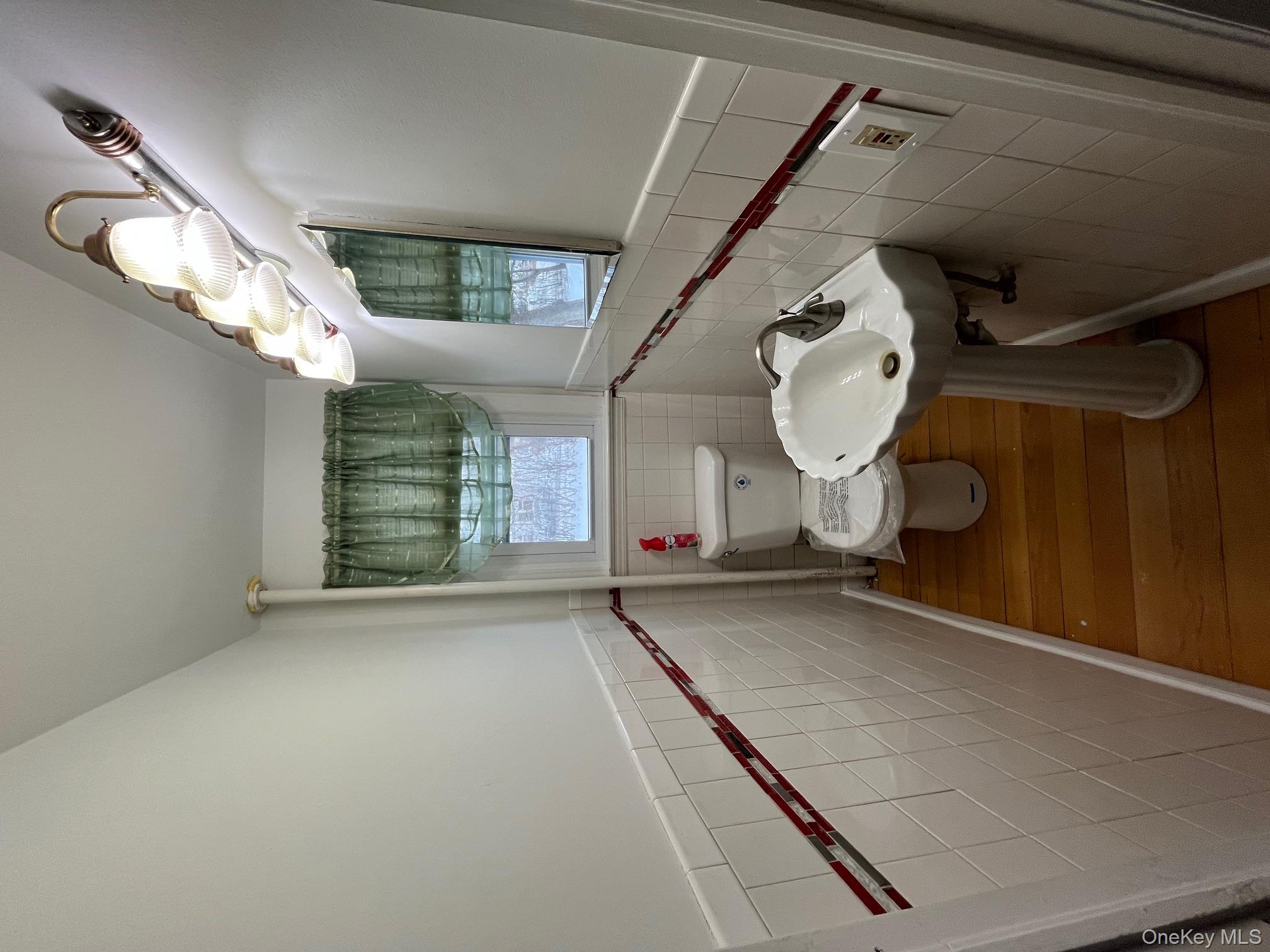 5 Elm Street Middletown, NY 10940 - Photo 10 of 13 Half Bathroom with pedestal sink