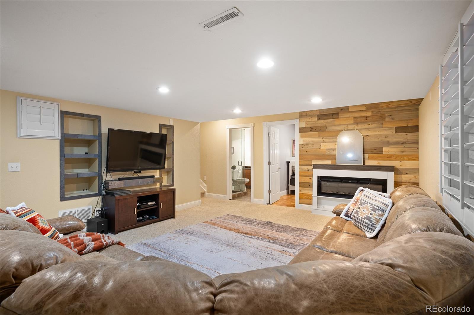 3559 Craftsbury Drive Highlands Ranch, CO 80126 - Photo 27 of 38 a bed room with a bed and television