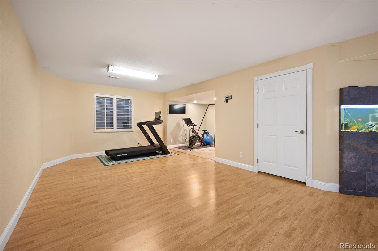 3559 Craftsbury Drive Highlands Ranch, CO 80126 - Photo 30 of 38 a view of a room with gym equipment